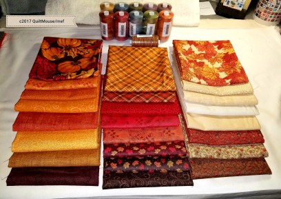 Autumn Lane Sampler Fat Quarter Bundle from Connecting Threads and some thread in Fall colors.
